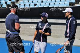 (L to R): Sam Groth (AUS) Former Tennis Player; Sergio Perez (MEX) Sahara Force India F1; and Esteban Ocon (FRA) Sahara Force India F1 Team, at the Margaret Court Arena. 21.03.2018. Formula 1 World Championship, Rd 1, Australian Grand Prix, Albert Park, Melbourne, Australia, Preparation Day.