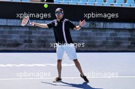 Sergio Perez (MEX) Sahara Force India F1 plays tennis at the Margaret Court Arena. 21.03.2018. Formula 1 World Championship, Rd 1, Australian Grand Prix, Albert Park, Melbourne, Australia, Preparation Day.