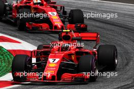 Kimi Raikkonen (FIN) Ferrari SF71H leads team mate Sebastian Vettel (GER) Ferrari SF71H. 29.06.2018. Formula 1 World Championship, Rd 9, Austrian Grand Prix, Spielberg, Austria, Practice Day.