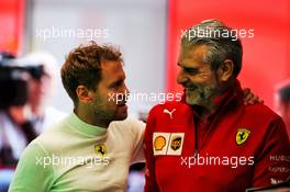 (L to R): Sebastian Vettel (GER) Ferrari with with Maurizio Arrivabene (ITA) Ferrari Team Principal. 29.06.2018. Formula 1 World Championship, Rd 9, Austrian Grand Prix, Spielberg, Austria, Practice Day.