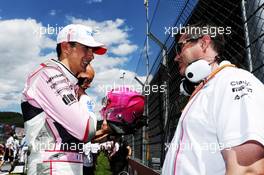 (L to R): Esteban Ocon (FRA) Sahara Force India F1 Team with Bradley Joyce (GBR) Sahara Force India F1 Race Engineer on the grid. 01.07.2018. Formula 1 World Championship, Rd 9, Austrian Grand Prix, Spielberg, Austria, Race Day.