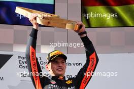Race winner Max Verstappen (NLD) Red Bull Racing celebrates on the podium. 01.07.2018. Formula 1 World Championship, Rd 9, Austrian Grand Prix, Spielberg, Austria, Race Day.