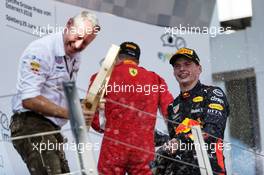 Race winner Max Verstappen (NLD) Red Bull Racing celebrates on the podium with Jonathan Wheatley (GBR) Red Bull Racing Team Manager. 01.07.2018. Formula 1 World Championship, Rd 9, Austrian Grand Prix, Spielberg, Austria, Race Day.