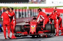 Sebastian Vettel (GER) Ferrari SF71H celebrates his third position with the team in parc ferme. 01.07.2018. Formula 1 World Championship, Rd 9, Austrian Grand Prix, Spielberg, Austria, Race Day.