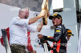 Race winner Max Verstappen (NLD) Red Bull Racing celebrates on the podium with Jonathan Wheatley (GBR) Red Bull Racing Team Manager. 01.07.2018. Formula 1 World Championship, Rd 9, Austrian Grand Prix, Spielberg, Austria, Race Day.