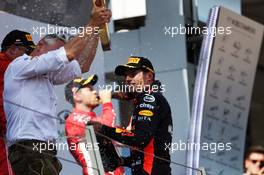 Race winner Max Verstappen (NLD) Red Bull Racing celebrates on the podium. 01.07.2018. Formula 1 World Championship, Rd 9, Austrian Grand Prix, Spielberg, Austria, Race Day.