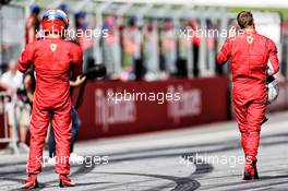 (L to R): second placed Kimi Raikkonen (FIN) Ferrari and third placed team mate Sebastian Vettel (GER) Ferrari in parc ferme. 01.07.2018. Formula 1 World Championship, Rd 9, Austrian Grand Prix, Spielberg, Austria, Race Day.