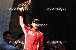 Sebastian Vettel (GER) Ferrari celebrates his third position on the podium. 01.07.2018. Formula 1 World Championship, Rd 9, Austrian Grand Prix, Spielberg, Austria, Race Day.