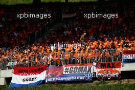 Max Verstappen (NLD) Red Bull Racing RB14 fans in the grandstand. 01.07.2018. Formula 1 World Championship, Rd 9, Austrian Grand Prix, Spielberg, Austria, Race Day.