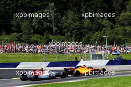 Fernando Alonso (ESP) McLaren MCL33 leads Charles Leclerc (MON) Sauber F1 Team C37. 01.07.2018. Formula 1 World Championship, Rd 9, Austrian Grand Prix, Spielberg, Austria, Race Day.