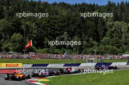 Pierre Gasly (FRA) Scuderia Toro Rosso STR13 leads Marcus Ericsson (SWE) Sauber C37; Brendon Hartley (NZL) Scuderia Toro Rosso STR13; and Fernando Alonso (ESP) McLaren MCL33. 01.07.2018. Formula 1 World Championship, Rd 9, Austrian Grand Prix, Spielberg, Austria, Race Day.