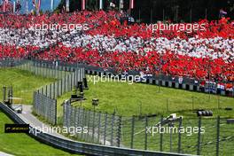 Fans in the grandstand. 01.07.2018. Formula 1 World Championship, Rd 9, Austrian Grand Prix, Spielberg, Austria, Race Day.