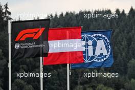 F1, FIA, and Austria flags. 30.06.2018. Formula 1 World Championship, Rd 9, Austrian Grand Prix, Spielberg, Austria, Qualifying Day.