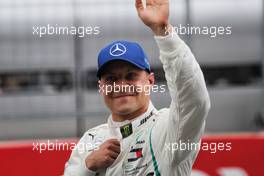 Valtteri Bottas (FIN) Mercedes AMG F1 celebrates his pole position in qualifying parc ferme. 30.06.2018. Formula 1 World Championship, Rd 9, Austrian Grand Prix, Spielberg, Austria, Qualifying Day.
