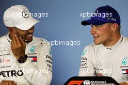 (L to R): Lewis Hamilton (GBR) Mercedes AMG F1 with team mate Valtteri Bottas (FIN) Mercedes AMG F1 in the post qualifying FIA Press Conference. 30.06.2018. Formula 1 World Championship, Rd 9, Austrian Grand Prix, Spielberg, Austria, Qualifying Day.
