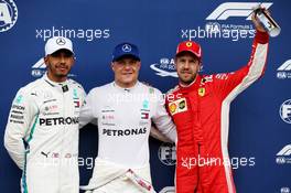 Qualifying top three in parc ferme (L to R): Lewis Hamilton (GBR) Mercedes AMG F1, second; Valtteri Bottas (FIN) Mercedes AMG F1, pole position; Sebastian Vettel (GER) Ferrari, third. 30.06.2018. Formula 1 World Championship, Rd 9, Austrian Grand Prix, Spielberg, Austria, Qualifying Day.