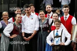Toto Wolff (GER) Mercedes AMG F1 Shareholder and Executive Director with traditionally attired entertainers in the paddock. 30.06.2018. Formula 1 World Championship, Rd 9, Austrian Grand Prix, Spielberg, Austria, Qualifying Day.