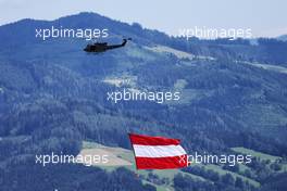 Austrian flag carried by a helicopter. 01.07.2018. Formula 1 World Championship, Rd 9, Austrian Grand Prix, Spielberg, Austria, Race Day.