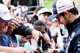Sergio Perez (MEX) Sahara Force India F1 signs autographs for the fans. 28.06.2018. Formula 1 World Championship, Rd 9, Austrian Grand Prix, Spielberg, Austria, Preparation Day.
