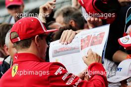 Kimi Raikkonen (FIN) Ferrari signs autographs for the fans. 28.06.2018. Formula 1 World Championship, Rd 9, Austrian Grand Prix, Spielberg, Austria, Preparation Day.