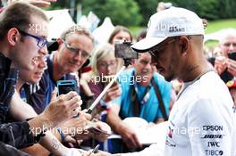 Lewis Hamilton (GBR) Mercedes AMG F1 signs autographs for the fans. 28.06.2018. Formula 1 World Championship, Rd 9, Austrian Grand Prix, Spielberg, Austria, Preparation Day.