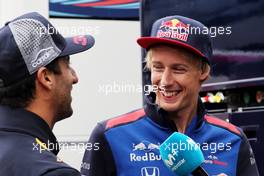 (L to R): Daniel Ricciardo (AUS) Red Bull Racing with Brendon Hartley (NZL) Scuderia Toro Rosso. 28.06.2018. Formula 1 World Championship, Rd 9, Austrian Grand Prix, Spielberg, Austria, Preparation Day.