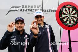 (L to R): Sergio Perez (MEX) Sahara Force India F1 with Esteban Ocon (FRA) Sahara Force India F1 Team - darts with Sky Sports F1. 28.06.2018. Formula 1 World Championship, Rd 9, Austrian Grand Prix, Spielberg, Austria, Preparation Day.