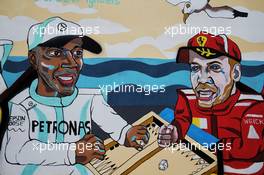 F1 drivers murals - (L to R): Lewis Hamilton (GBR) Mercedes AMG F1 and Sebastian Vettel (GER) Ferrari. 27.04.2018. Formula 1 World Championship, Rd 4, Azerbaijan Grand Prix, Baku Street Circuit, Azerbaijan, Practice Day.