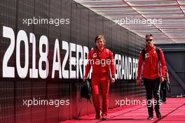 Sebastian Vettel (GER) Ferrari with Antti Kontsas (FIN) Personal Trainer. 27.04.2018. Formula 1 World Championship, Rd 4, Azerbaijan Grand Prix, Baku Street Circuit, Azerbaijan, Practice Day.