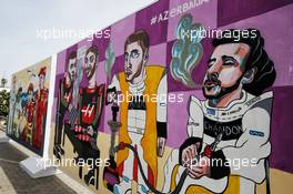 F1 drivers murals - (L to R): Stoffel Vandoorne (BEL) McLaren and Fernando Alonso (ESP) McLaren. 27.04.2018. Formula 1 World Championship, Rd 4, Azerbaijan Grand Prix, Baku Street Circuit, Azerbaijan, Practice Day.