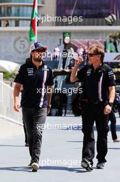 Sergio Perez (MEX) Sahara Force India F1 with Xavi Martos (ESP) Sahara Force India F1 Team Physio. 27.04.2018. Formula 1 World Championship, Rd 4, Azerbaijan Grand Prix, Baku Street Circuit, Azerbaijan, Practice Day.
