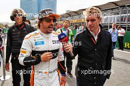 Fernando Alonso (ESP) McLaren with Simon Lazenby (GBR) Sky Sports F1 TV Presenter on the grid. 29.04.2018. Formula 1 World Championship, Rd 4, Azerbaijan Grand Prix, Baku Street Circuit, Azerbaijan, Race Day.
