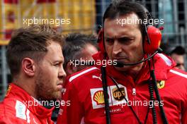 (L to R): Sebastian Vettel (GER) Ferrari with Riccardo Adami (ITA) Ferrari Race Engineer on the grid. 29.04.2018. Formula 1 World Championship, Rd 4, Azerbaijan Grand Prix, Baku Street Circuit, Azerbaijan, Race Day.