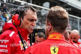 (L to R): Riccardo Adami (ITA) Ferrari Race Engineer with Sebastian Vettel (GER) Ferrari on the grid. 29.04.2018. Formula 1 World Championship, Rd 4, Azerbaijan Grand Prix, Baku Street Circuit, Azerbaijan, Race Day.