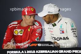 Kimi Raikkonen (FIN) Scuderia Ferrari and Lewis Hamilton (GBR) Mercedes AMG F1   29.04.2018. Formula 1 World Championship, Rd 4, Azerbaijan Grand Prix, Baku Street Circuit, Azerbaijan, Race Day.