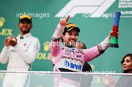 Sergio Perez (MEX) Sahara Force India F1 celebrates his third position on the podium. 29.04.2018. Formula 1 World Championship, Rd 4, Azerbaijan Grand Prix, Baku Street Circuit, Azerbaijan, Race Day.