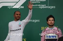 1st place Lewis Hamilton (GBR) Mercedes AMG F1 W09 and 3rd place Sergio Perez (MEX) Sahara Force India F1 VJM11. 29.04.2018. Formula 1 World Championship, Rd 4, Azerbaijan Grand Prix, Baku Street Circuit, Azerbaijan, Race Day.