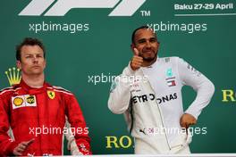 (L to R): Kimi Raikkonen (FIN) Ferrari and race winner Lewis Hamilton (GBR) Mercedes AMG F1 on the podium. 29.04.2018. Formula 1 World Championship, Rd 4, Azerbaijan Grand Prix, Baku Street Circuit, Azerbaijan, Race Day.