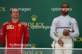 Kimi Raikkonen (FIN) Ferrari SF71H and Lewis Hamilton (GBR) Mercedes AMG F1 W09. 29.04.2018. Formula 1 World Championship, Rd 4, Azerbaijan Grand Prix, Baku Street Circuit, Azerbaijan, Race Day.