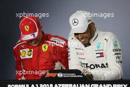Kimi Raikkonen (FIN) Scuderia Ferrari and Lewis Hamilton (GBR) Mercedes AMG F1   29.04.2018. Formula 1 World Championship, Rd 4, Azerbaijan Grand Prix, Baku Street Circuit, Azerbaijan, Race Day.