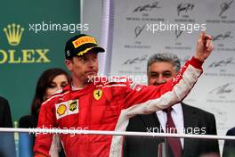 Kimi Raikkonen (FIN) Ferrari celebrates his second position on the podium. 29.04.2018. Formula 1 World Championship, Rd 4, Azerbaijan Grand Prix, Baku Street Circuit, Azerbaijan, Race Day.