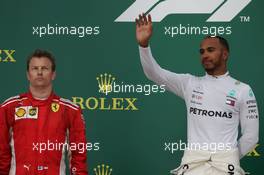 Kimi Raikkonen (FIN) Ferrari SF71H and Lewis Hamilton (GBR) Mercedes AMG F1 W09. 29.04.2018. Formula 1 World Championship, Rd 4, Azerbaijan Grand Prix, Baku Street Circuit, Azerbaijan, Race Day.