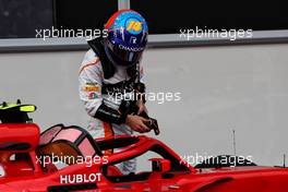 Fernando Alonso (ESP) McLaren in parc ferme with the Ferrari SF71H of Kimi Raikkonen (FIN) Ferrari. 29.04.2018. Formula 1 World Championship, Rd 4, Azerbaijan Grand Prix, Baku Street Circuit, Azerbaijan, Race Day.