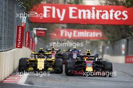 Max Verstappen (NLD) Red Bull Racing RB14 and Charles Leclerc (MON) Sauber F1 Team C37. 29.04.2018. Formula 1 World Championship, Rd 4, Azerbaijan Grand Prix, Baku Street Circuit, Azerbaijan, Race Day.