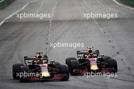 (L to R): Daniel Ricciardo (AUS) Red Bull Racing RB14 and team mate Max Verstappen (NLD) Red Bull Racing RB14 battle for position. 29.04.2018. Formula 1 World Championship, Rd 4, Azerbaijan Grand Prix, Baku Street Circuit, Azerbaijan, Race Day.