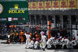 Fernando Alonso (ESP) McLaren MCL33; Kevin Magnussen (DEN) Haas VF-18; and Marcus Ericsson (SWE) Sauber C37 make a pit stop. 29.04.2018. Formula 1 World Championship, Rd 4, Azerbaijan Grand Prix, Baku Street Circuit, Azerbaijan, Race Day.