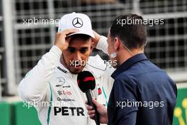 Lewis Hamilton (GBR) Mercedes AMG F1 with Will Buxton (GBR) F1 Digital Presenter in qualifying parc ferme. 28.04.2018. Formula 1 World Championship, Rd 4, Azerbaijan Grand Prix, Baku Street Circuit, Azerbaijan, Qualifying Day.