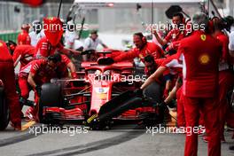 Sebastian Vettel (GER) Ferrari SF71H practices a pit stop.