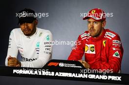 (L to R): Lewis Hamilton (GBR) Mercedes AMG F1 and Sebastian Vettel (GER) Ferrari in the post qualifying FIA Press Conference. 28.04.2018. Formula 1 World Championship, Rd 4, Azerbaijan Grand Prix, Baku Street Circuit, Azerbaijan, Qualifying Day.