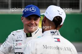 (L to R): Valtteri Bottas (FIN) Mercedes AMG F1 with team mate Lewis Hamilton (GBR) Mercedes AMG F1 in qualifying parc ferme. 28.04.2018. Formula 1 World Championship, Rd 4, Azerbaijan Grand Prix, Baku Street Circuit, Azerbaijan, Qualifying Day.